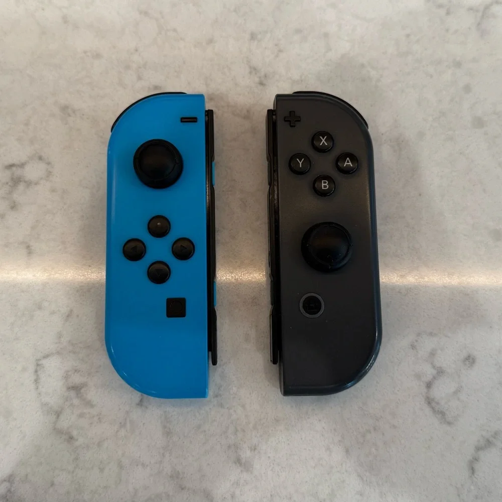 Nintendo Switch Console w/ Game, Case, Dock, and Joy-Cons.